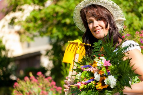 Happy homeowners enjoying their landscaped garden